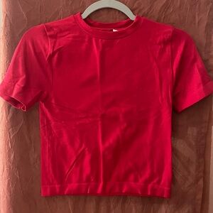 A new day red small nylon shirt.